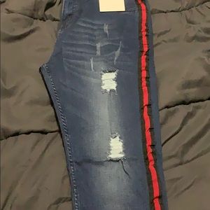 Stylish man Dark blue blue jeans with Rips